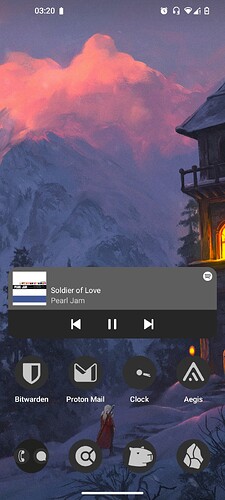 Screenshot of LineageOS launcher with 1 row of apps on the homescreen and another row on the taskbar. There's only one widget for Spotify currently playing Pearl Jam - Soldier of Love. The wallpaper is the same showcased on the desktop screenshot.